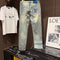 Louis Vuitton Logo-Embroidered Jeans