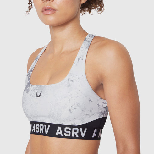 W083. LYCRA® ADAPTIV Racerback Sports Bra - Sedona Snow Camo